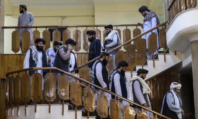 Taliban officials arrive at a news conference to announce an acting cabinet for the new Taliban government in Kabul on Tuesday, Sept. 7, 2021. (Victor J. Blue/The New York Times)