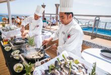 Chefs cooking on a Viking cruise ship